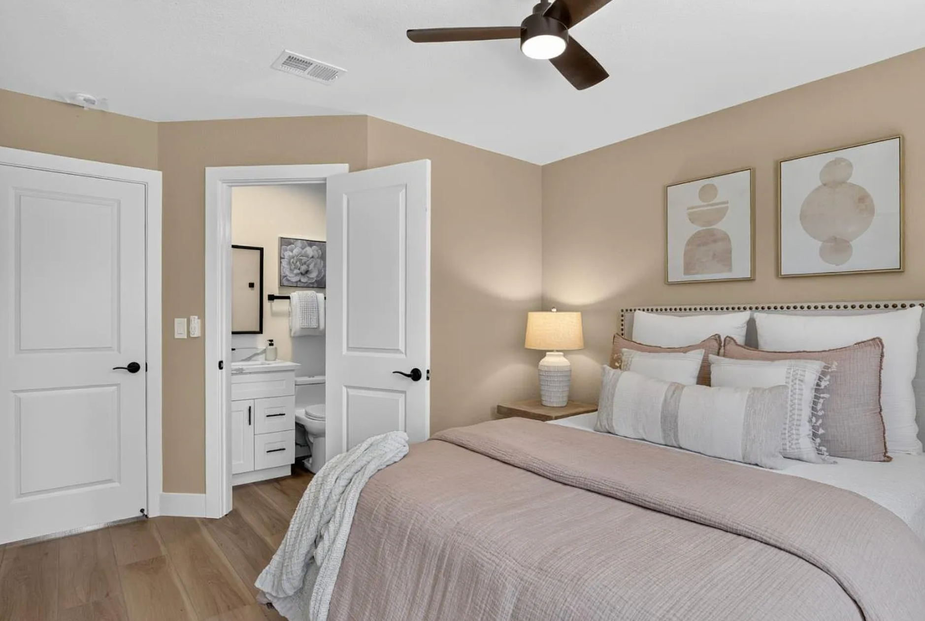 Completed bedroom suite with an updated private bathroom